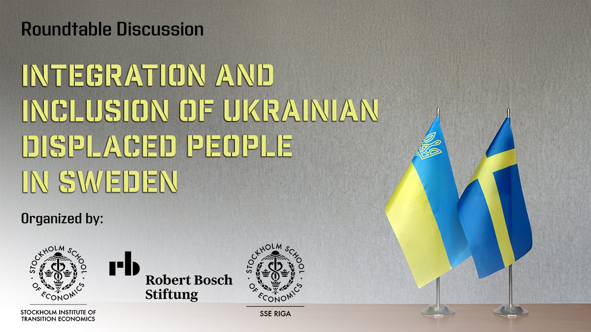 Tabletop flags of Ukraine and Sweden on a gray blurred background.