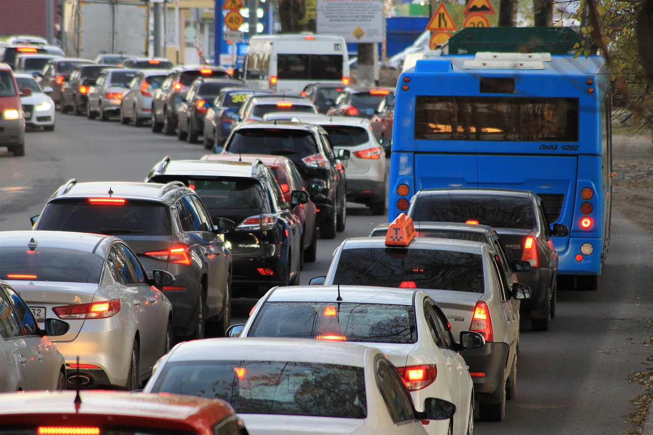 Urban traffic congestion with cars , taxis and buses